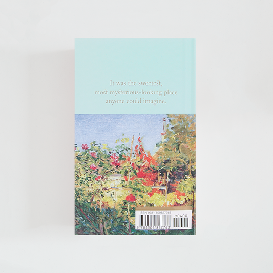 Trasera del libro The Secret Garden de Frances Hodgson Burnett (The Collector's Library) de color celeste acompañada de imagen inspirada en la novela.