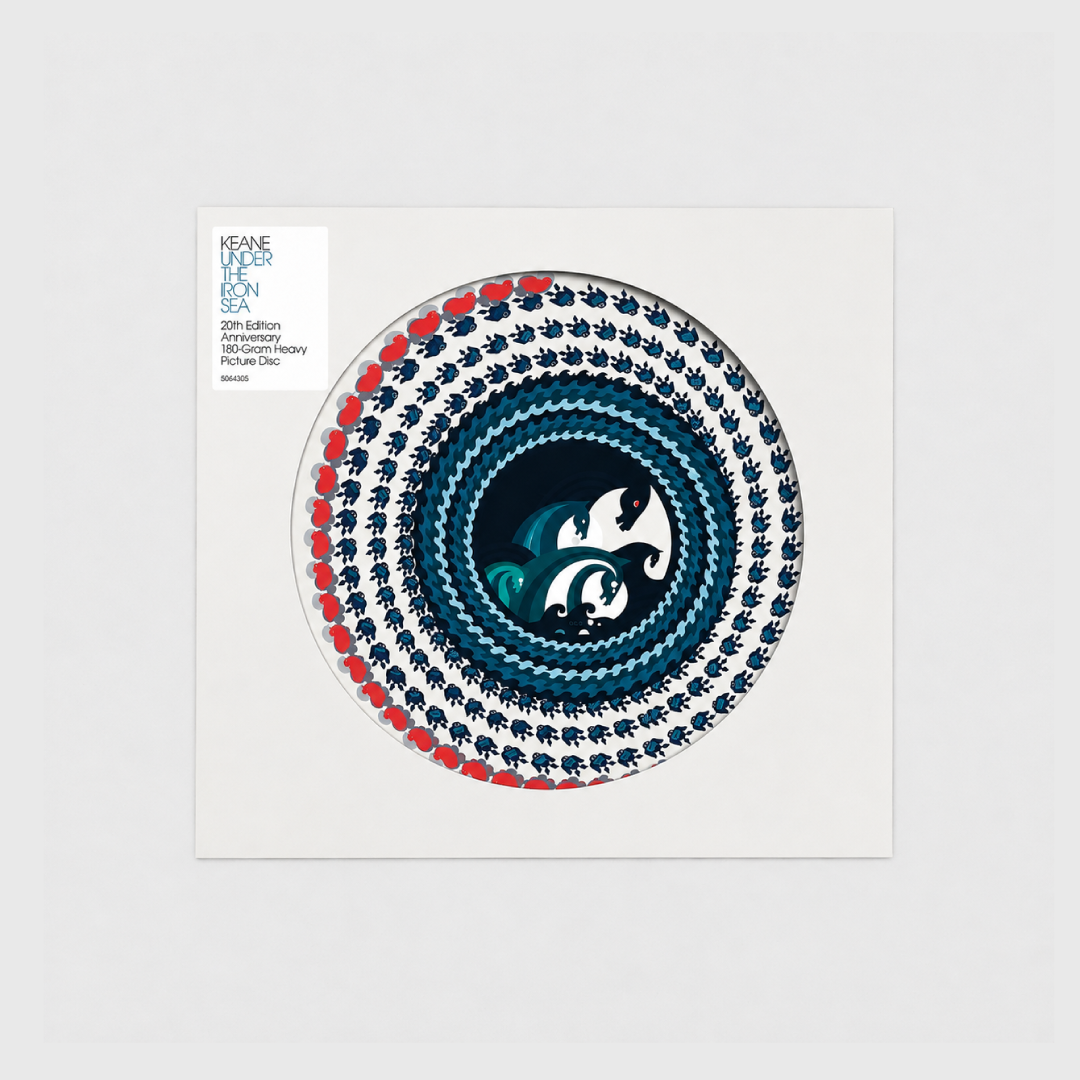 Edición 20.º aniversario de Under the Iron Sea de Keane en formato Picture Disc de 180 gramos, con funda blanca de apertura circular que deja ver el diseño ilustrado del vinilo y una etiqueta con la información de la edición especial.