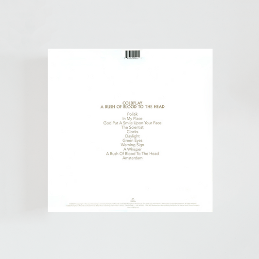 Contraportada del álbum A Rush of Blood to the Head de Coldplay, con diseño minimalista en blanco y negro, tipografía sobria y listado de canciones junto a los créditos del disco.