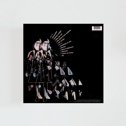 Contraportada del álbum “Franz Ferdinand” con fondo negro, texto en blanco con el listado de canciones, créditos de producción y la tipografía característica de la banda.