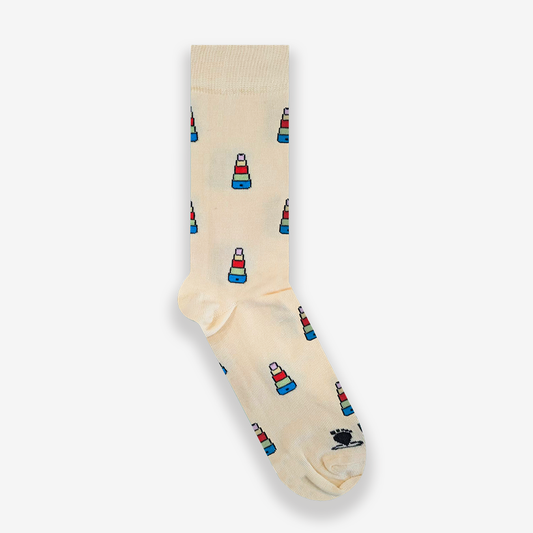 Calcetines color beige con estampado de incensarios de colores diseñados por Superbritánico en conmemoración del orgullo de Sevilla de 2025 sobre fondo blanco.