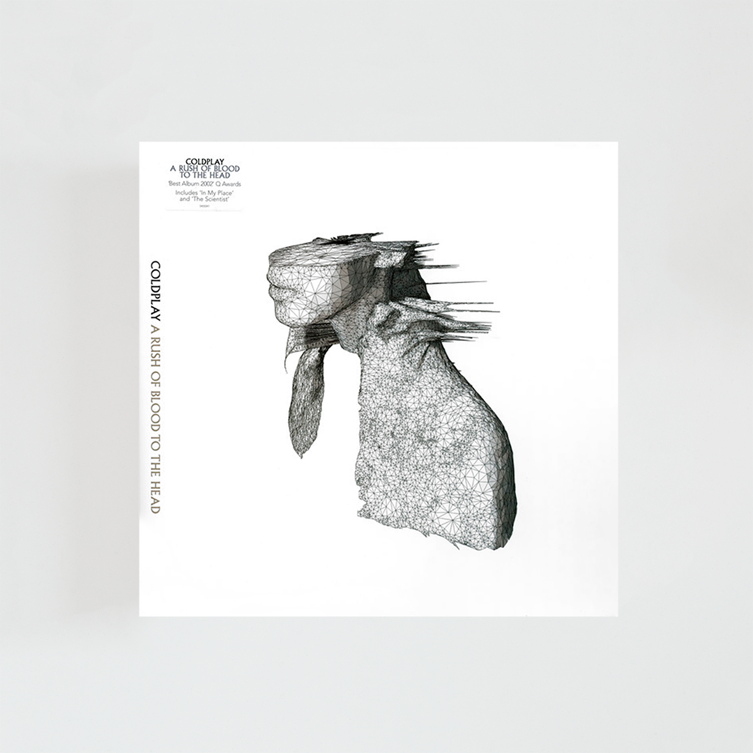 Portada del álbum A Rush of Blood to the Head de Coldplay, con una fotografía en blanco y negro de una escultura clásica de un busto humano sobre fondo negro, de estética minimalista y atmosférica.