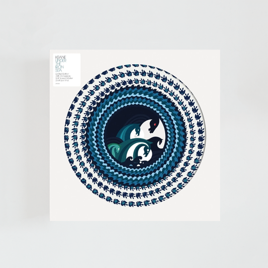 Edición 20.º aniversario de Under the Iron Sea de Keane en formato Picture Disc de 180 gramos, con funda blanca de apertura circular que deja ver el diseño ilustrado del vinilo y una etiqueta con la información de la edición especial.