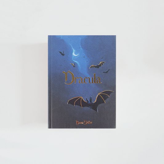 Portada de Dracula de Bram Stoker, edición Wordsworth Collector’s Edition en tonos azul oscuro, con murciélagos, luna creciente y el título en dorado.