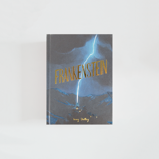 Portada de Frankenstein de Mary Shelley, edición Wordsworth Collector’s Edition en azul y gris, con un relámpago iluminando un paisaje montañoso y una casa en la distancia.