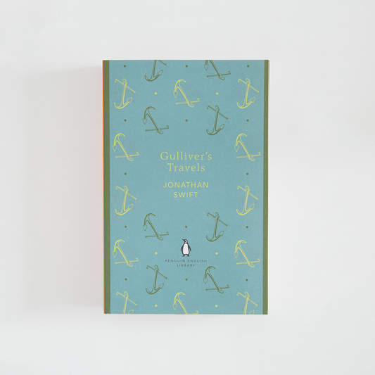 Portada del libro Gulliver's travels de Jonathan Swift color turquesa con título e ilustraciones de anclas de color amarillo.