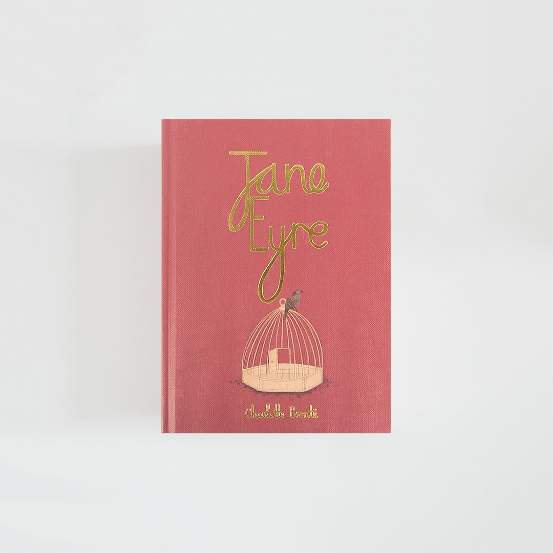 Portada de Jane Eyre de Charlotte Brontë, edición Wordsworth Collector’s Edition en rosa rojizo, con una jaula de pájaros y tipografía dorada.
