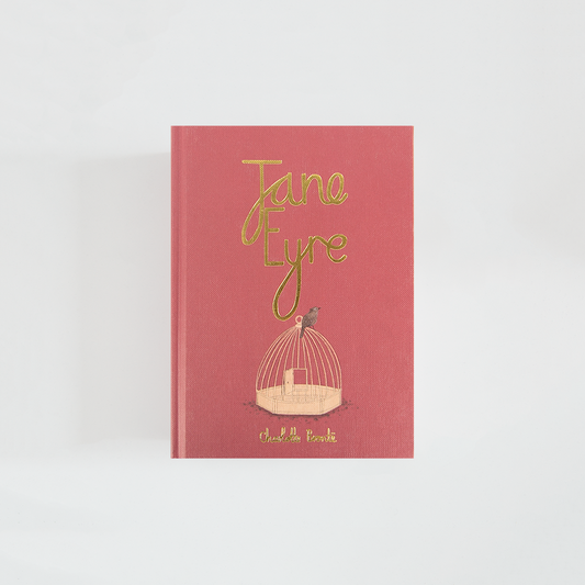 Portada de Jane Eyre de Charlotte Brontë, edición Wordsworth Collector’s Edition en rosa rojizo, con una jaula de pájaros y tipografía dorada.
