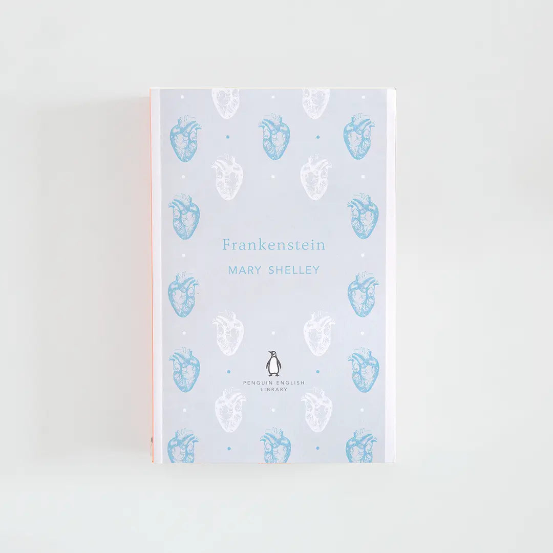 Portada en gris y azul del libro en inglés Frankenstein de Mary Shelley de la colección Penguin English Library sobre fondo blanco.
