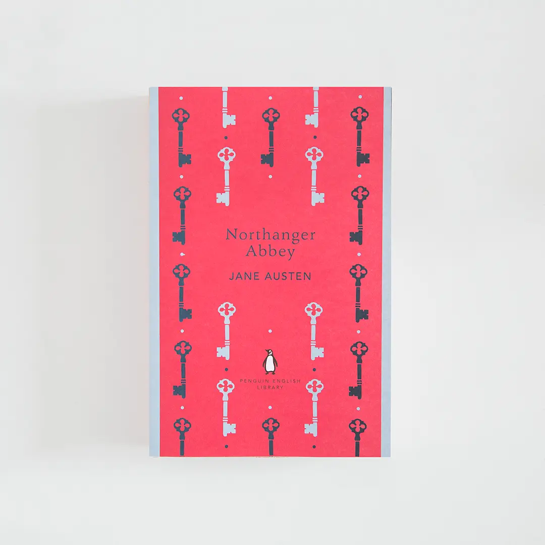 Portada rojo y celeste del libro en inglés Northanger Abbey  de Jane Austen de la colección Penguin English Library sobre fondo blanco.
