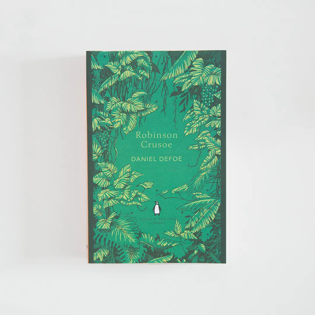 Portada en tonos de verde del libro en inglés Robinson Crusoe de Daniel Defoe de la colección Penguin English Library sobre fondo blanco.
