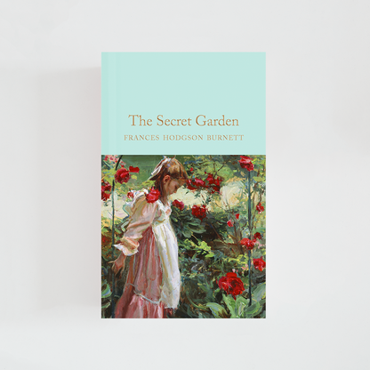 Portada del libro The Secret Garden de Frances Hodgson Burnett (The Collector's Library) de color celeste acompañada de imagen inspirada en la novela.