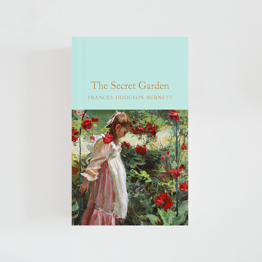 Portada del libro The Secret Garden de Frances Hodgson Burnett (The Collector's Library) de color celeste acompañada de imagen inspirada en la novela.
