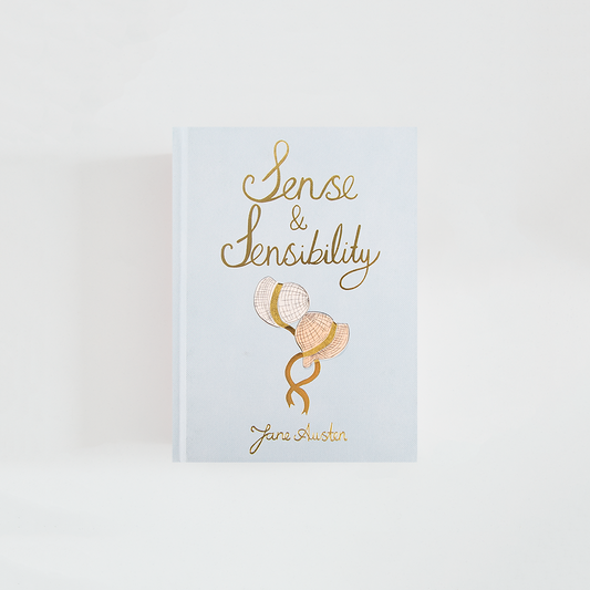 Portada de Sense and Sensibility de Jane Austen, edición Wordsworth Collector’s Edition en azul muy claro, con dos sombreros de época entrelazados y tipografía dorada.