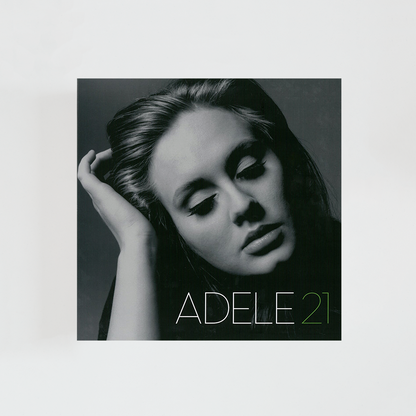 Portada del vinilo 21 de Adele, con la cantante mirando hacia abajo sobre un fondo neutro, álbum de pop y soul británico de 2011.