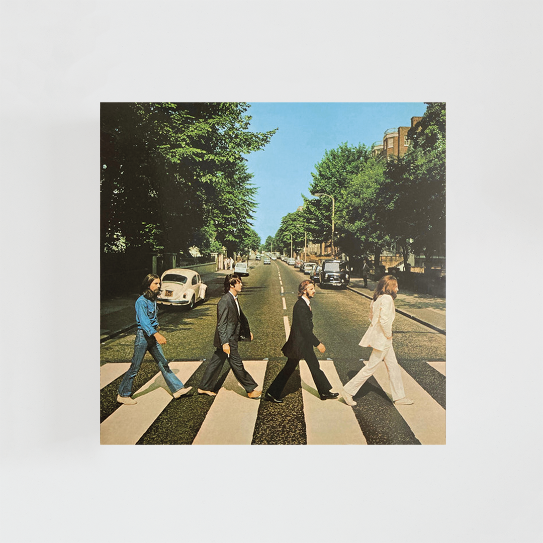 Portada del álbum “Abbey Road” de The Beatles, con los cuatro miembros del grupo cruzando un paso de peatones en Londres frente a los estudios Abbey Road.