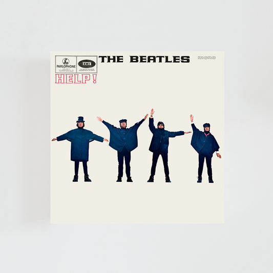 Portada del vinilo Help! de The Beatles, con los cuatro miembros de la banda posando con los brazos extendidos formando señales sobre un fondo azul, álbum clásico de rock británico de 1965.